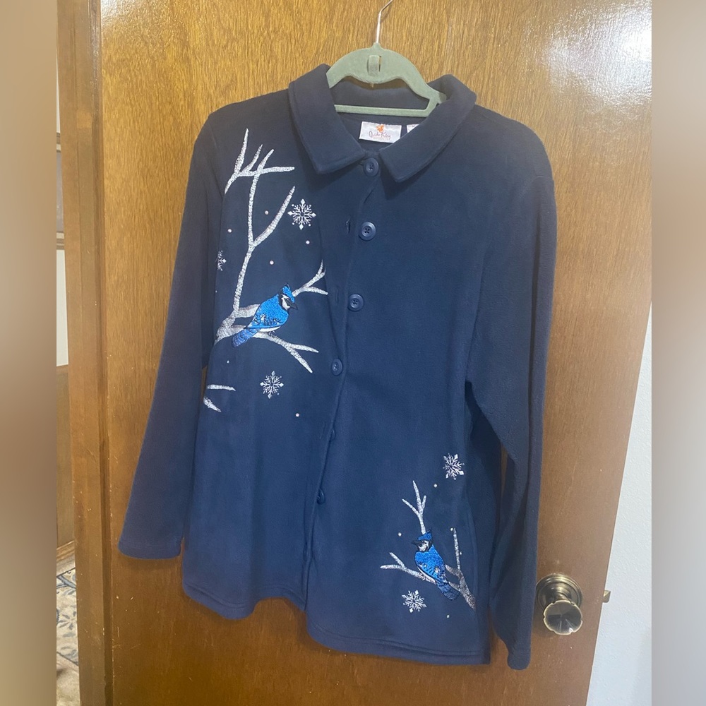 Blue long sleeve fleece jacket with embroidered blue jays/snow/limbs.  Size M.